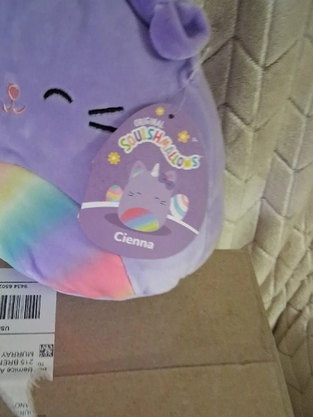 Squishmallows Cienna The Purple Unicorn Cat with Pastel Rainbow Belly.